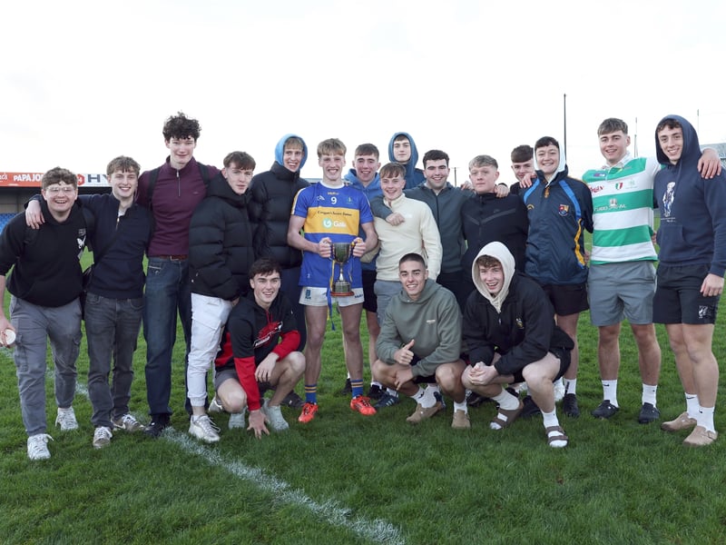 Caption: St Francis Dromard captain William McEntire with his school mates from Tipperary who travelled to Longford to support him in the Glenn Brady Cup Final replay Picture: Syl Healy