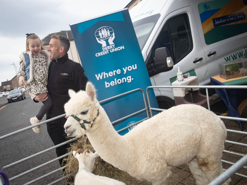 Dad Conor and daughter Clodagh McDaid enjoying some of the animals.