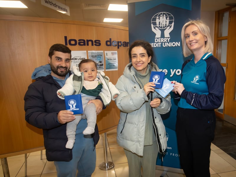 Derry Credit Union's Claire McLaughlin pictured with the Alghadban family during International Credit Union Day celebrations on Saturday.