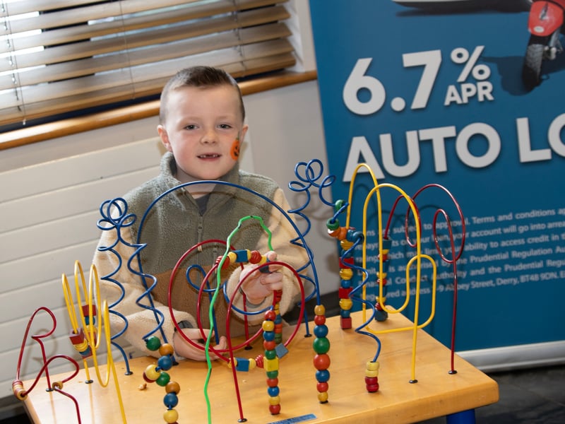 This young man checking his counting ability during Saturday's celebrations at Derry Credit Union.