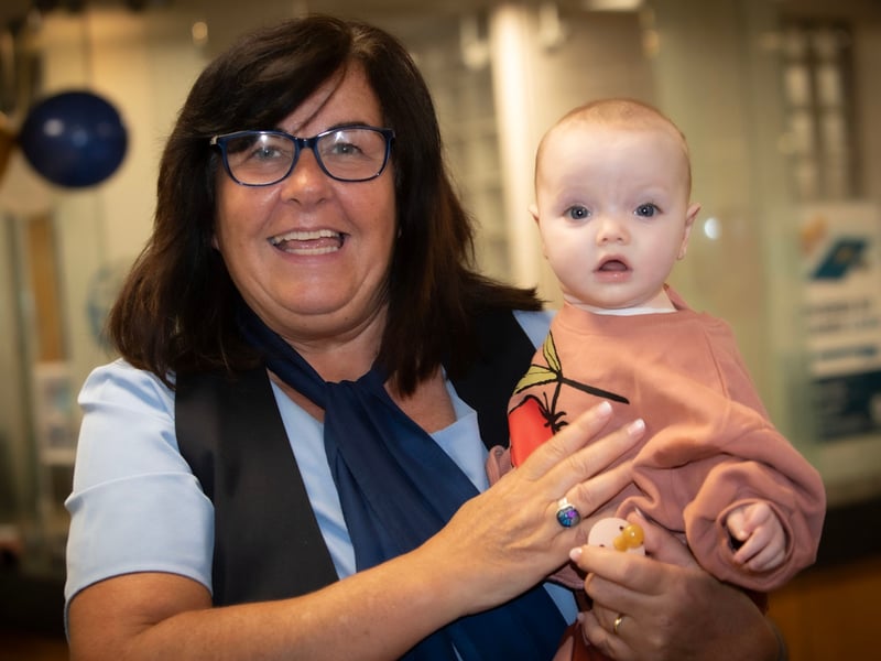Derry Credit Union staff member Suzanne Cooley pictured with her granddaughter at Saturday's International Credit Union Day celebrations. (Photos: Jim McCafferty Photography)
