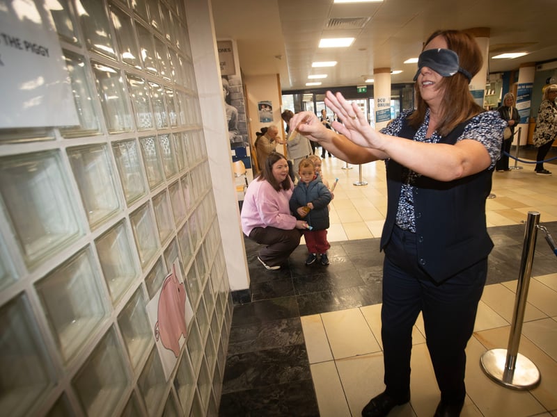 Derry Credit Union staff member Sharon Doherty getting in on the celebrations on Saturday during International Credit Union Day. (Photos: Jim McCafferty Photography)
