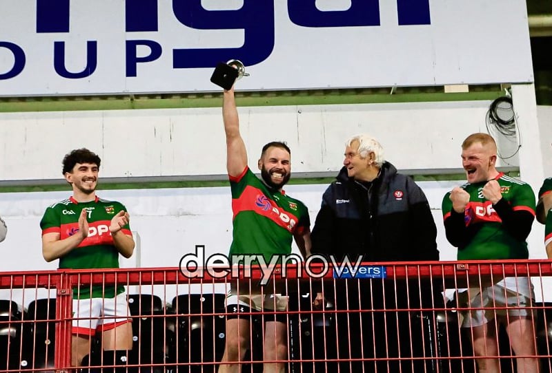 Slaughtmanus captain Jason Ferguson lifing the GAA GAA Junior Reserves Championship in victory over Sean Dolans.