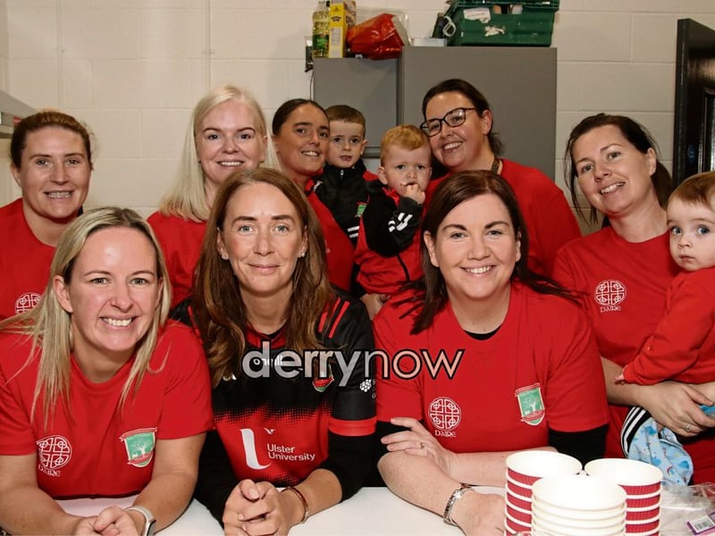 The girls working hard in the kitchen for the coffee morning.