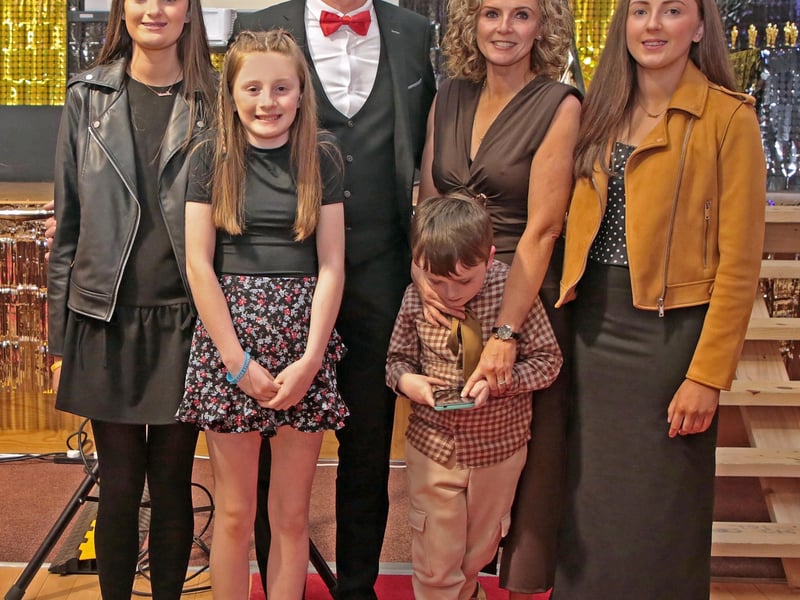Caption: Annie, Norah, Maisie, Eamon, Terry and Áine Drake