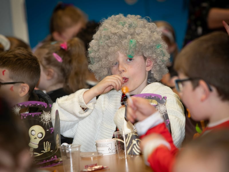P3 pupil Darragh taking time out from his busy schedule during Friday's Halloween festivities at Greenhaw PS.