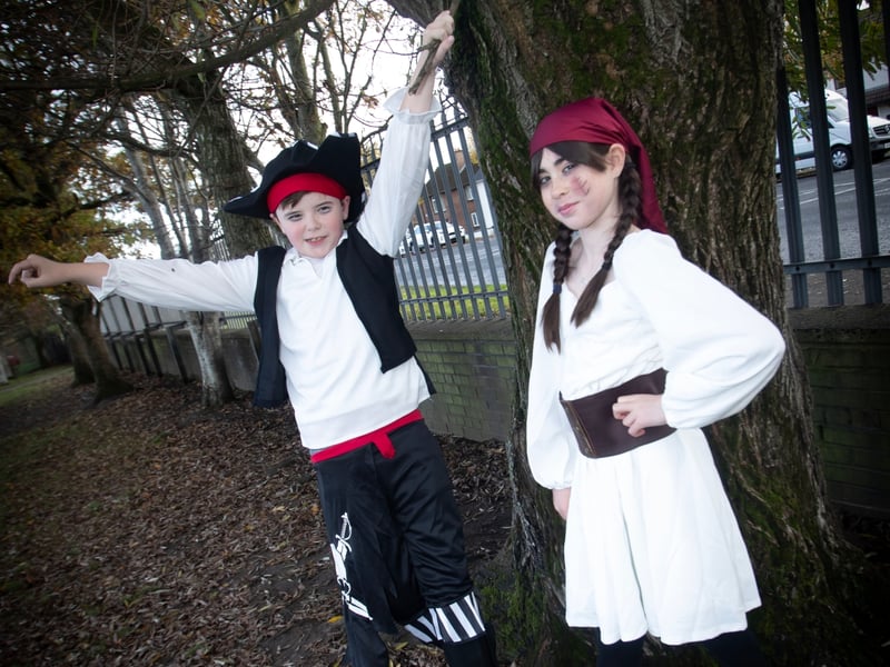 P7 pupils Olivia and Emmett show off their costumes on Friday.