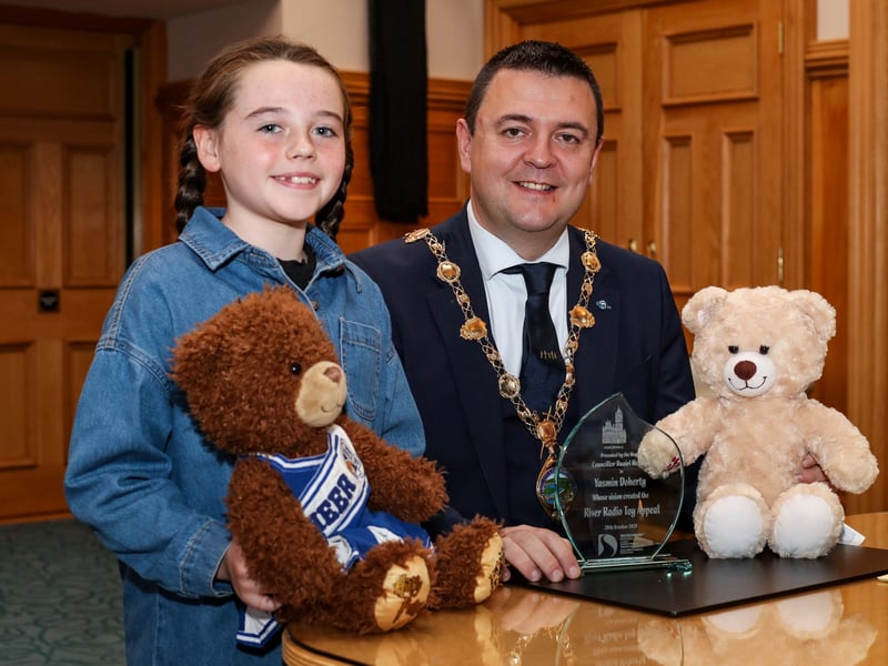 The Mayor of Derry & Strabane, Councillor Ruairi McHugh with 9 years Yazmin Doherty, Founder of the River Radio Toy Appeal, at a reception in the Guildhall.