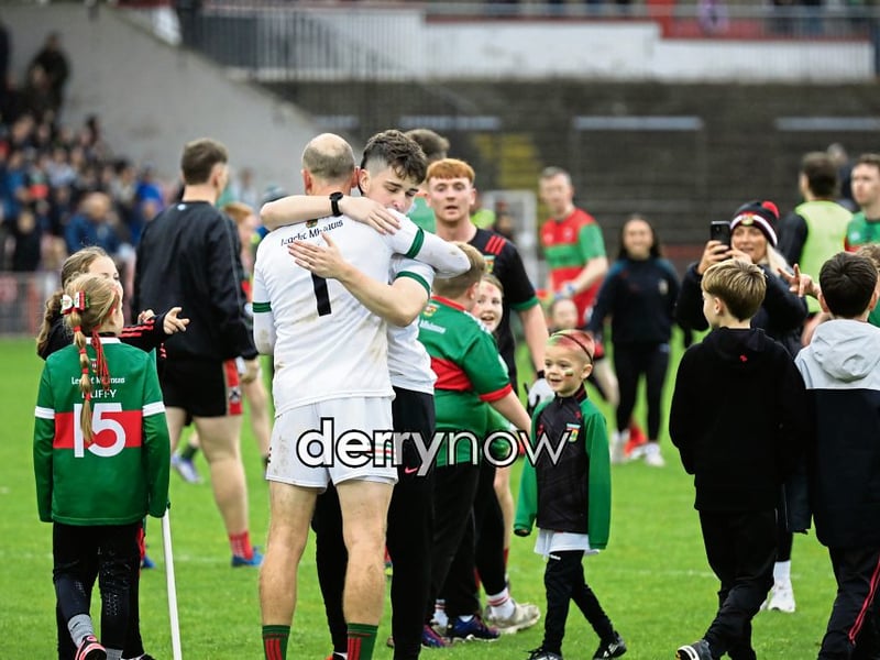 Slaughtmanus’ Cormac Hanna receives congratulations at the end of the game as the team celebrates winning the Premier Electrics Derry GAA Club Junior Championship final.