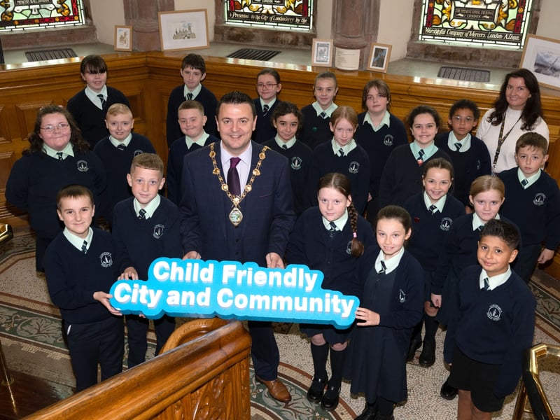 Pupils from Longtower Primary School with the Mayor of Derry City and Strabane District Council, Councillor Ruairí McHugh.