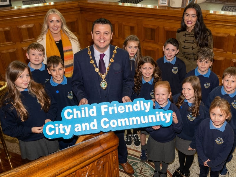 Pupils from Strabane Primary School with the Mayor of Derry City and Strabane District Council, Councillor Ruairí McHugh.
