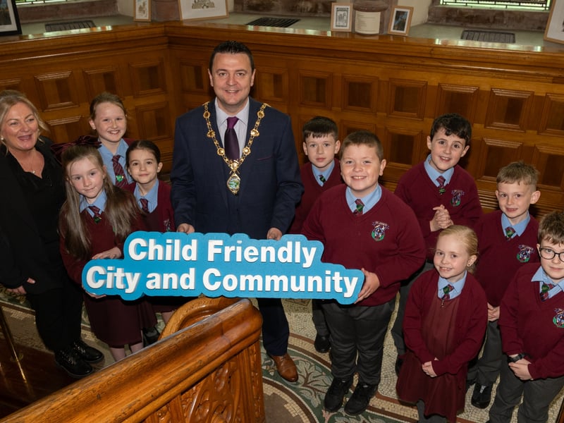 Pupils from St. John's Primary School with the Mayor of Derry City and Strabane District Council, Councillor Ruairí McHugh.