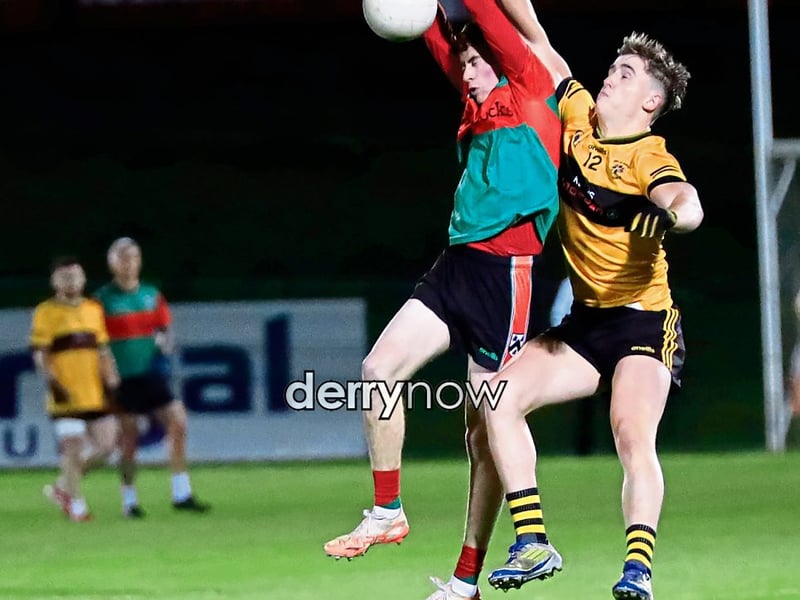Action from the GAA Junior Football Championship semi-final between Doire Trasna v Moneymore at Owenbeg.