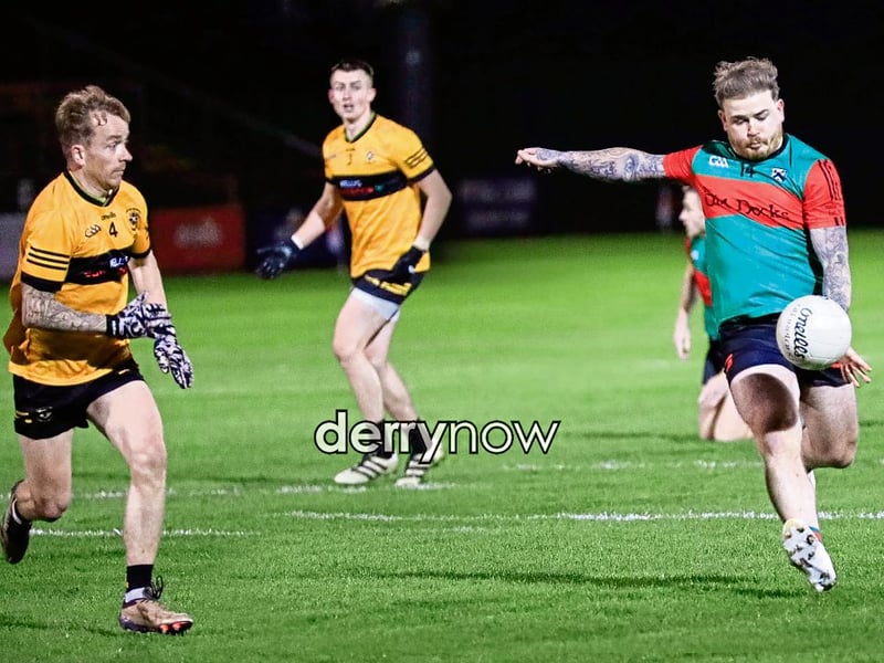 Doire Trasna's Eoghan Quigg prepares to send the ball up the field.