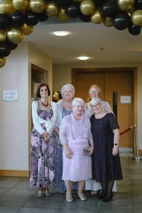 Pettigo-based Borderline Players celebrated the theatre group's 25th anniversary with celebrations culminating in a formal gala ball at the village’s Termon Complex which has served as the home venue for the talented group since 2014. Click on the arrows to see a gallery of photos from the evening: Patrons and supporters joined 170 current and former group members on the evening to reflect on the achievements of the group and its contributions to community life in Pettigo and Tullyhommon over the last 25 years. Founding member and group chairperson, Siobhan O’Brien said the night had exceeded her hopes and expectations and she reflected that organising the event had been more emotional than expected. Following a career on both sides of the Atlantic in hospitality, Siobhan began teaching drama in Pettigo in the late 1990s and one evening following a youth drama class she spoke to two parents about the possibility of staging a pantomime. The idea took legs and a first meeting of what would become Borderline Players was held in September 2000. Little Jack Horner was the group’s first production, staged in April 2001 following a protracted rehearsal period due to the foot and mouth crisis. READ NEXT: Flashback - Looking back over Borderline Players' 25 years of fabulous entertainment Siobhan reflected upon late night rehearsals and the challenges of having no money to put on the show, but the overwhelming success of the production and the sense of community and camaraderie that had been established with people from both sides of the border taking part, she knew that this was just the beginning of the group’s journey. Since the group’s debut they have produced over 30 pantomimes and plays, hosted the annual Pettigo and Tullyhommon Cultural Festival between 2002 and 2020 and welcomed members from communities including Ballyshannon, Belleek, Belturbet, Derrygonnelly, Ederney, Enniskillen, Garrison and Irvinestown. Donal Monaghan was just 14 years old when he joined the group and following acting roles