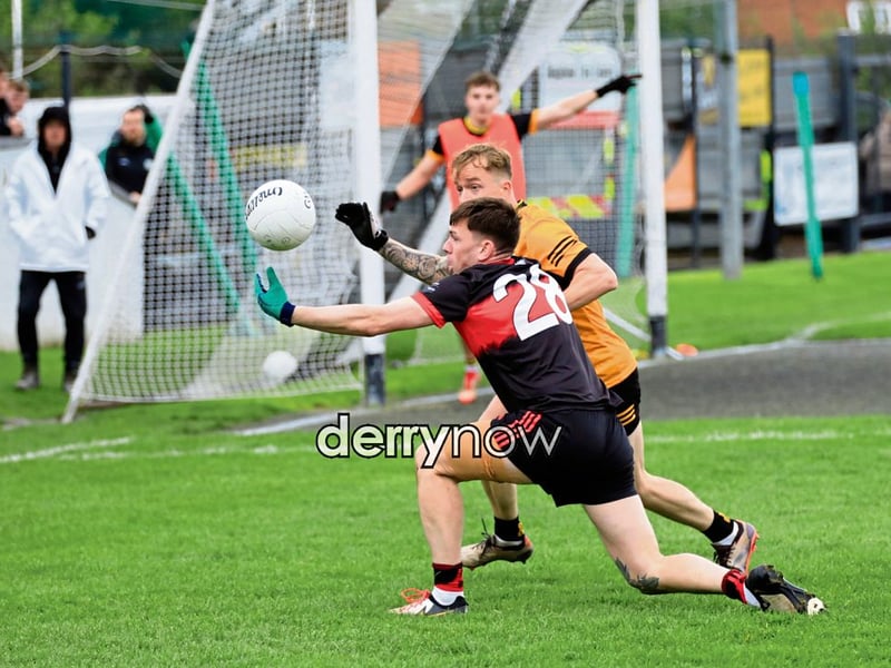 Sean Dolans Odhran McKane prepares to grab the ball.