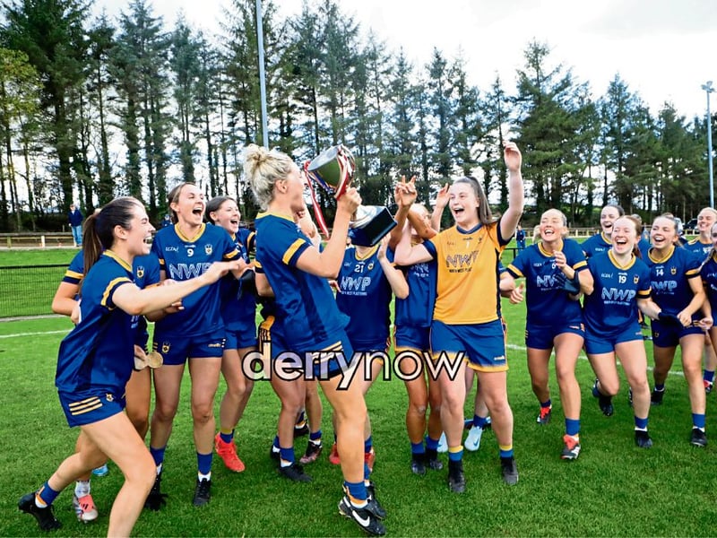 Steelstown's captain Aoife McGough brings the cup to her ecstatic team as they celebrate beating Magherafelt.