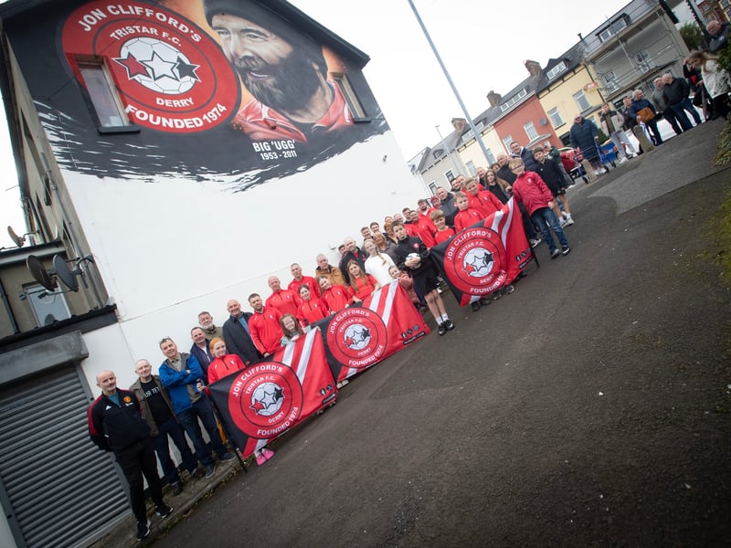 Tristar FC players (present and past), coaches, officials and family of club founder Jon 'Ugg' Clifford pictured during a new mural unveiling in his honour overlooking Bull Park on Saturday. (Photos: Jim McCafferty Photography)
