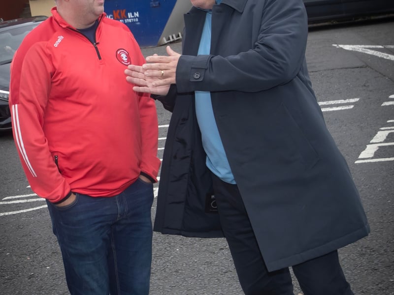 Tristar official Johnnie McDermott in conversation with Gary Matthewson during Saturday's unveiling of a new mural to Tristar club founder Jon 'Ugg' Clifford overlooking Bull Park.