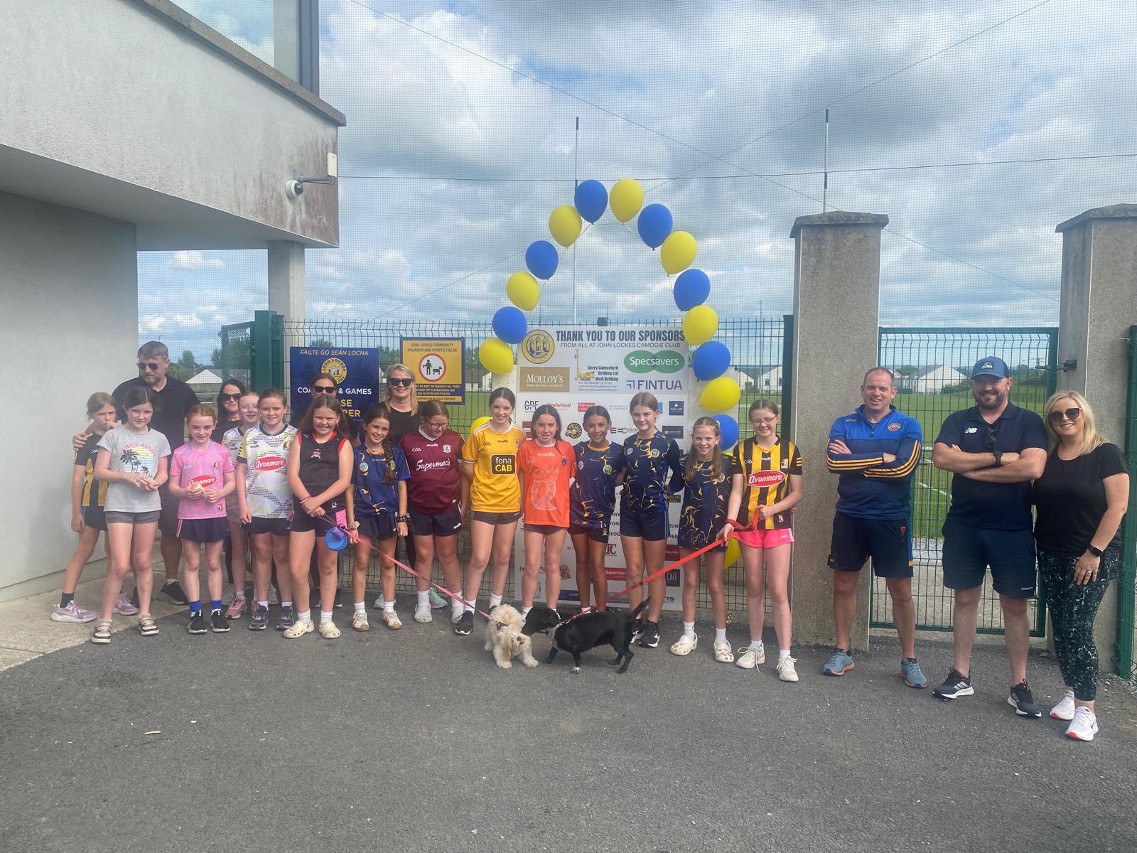 The John Lockes Camogie held their inaugural Dawn to Dusk Walkathon last Saturday at John Locke Park. To say they nailed it with this unique fundraiser is an understatement as the total raised for the day is closing in on €10,000. Speaking with one of the main drivers of the fundraiser, club PRO Jane Phelan said the response received from both sponsors and participants was beyond all expectations, and they now know this event will become an annual fixture with the club aiming to make it even bigger. What an incredible day the club put together, where our Walkathon ran from dawn at 5am right through to dusk at 5pm. The amazing Dawn to Dusk committee members and team leaders did all the organising and kept the energy going hour after hour.  The wonderful Callan community, along with John Lockes camogie players, coaches and families showed up in such great numbers with enthusiasm. A special word of thanks to John Lockes GAA Club for their continued support as we move closer to becoming one club, and for kindly providing the facilities despite their busy calendar. SEE ALSO: Kilkenny parish show appreciation to hugely popular outgoing priest The junior camogie team, who had a wonderful win over Graignamanagh in the championship on Friday evening, finished off the day with a well-organised table quiz in The Big Wheel- great craic was had by all. The spirit, support and sense of community truly shone through from dawn to dusk and we are extremely grateful to all. As the Walkathon continued, there was an U10 blitz held on the main pitch. Teams travelled from Kilmacow, Conahy Shamrocks and Graignamanagh for a wonderful morning of camogie by the young girls. Kilkenny hurling star Cian Kenny, whose great-grandfather Mick Kenny captained John Lockes to their only senior hurling title in 1957, was on hand to give encouragement to the players and also joined some of the Walkathon participants. Cian later led his club team James Stephens to a resounding victory over Dunnamaggin in the park in the afternoon.  It