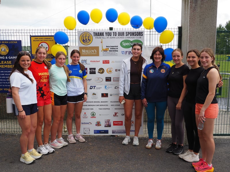 Jane Phelan with Junior players. L to R: Sarah Roche, Aisling O'Sullivan, Rachel Phelan, Emily Phelan, Anna Comerford, Julie Nolan, Sadhbh McCormack, Laura Phelan