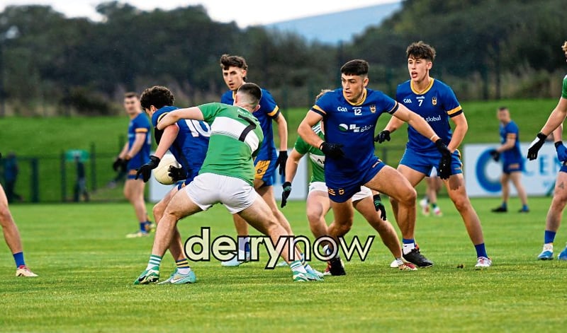 Steelstown's Daniel McAteer holds off Loup player Padraig McAlynn at Owenbeg. (Photos: Keith Moore, nwpresspics)