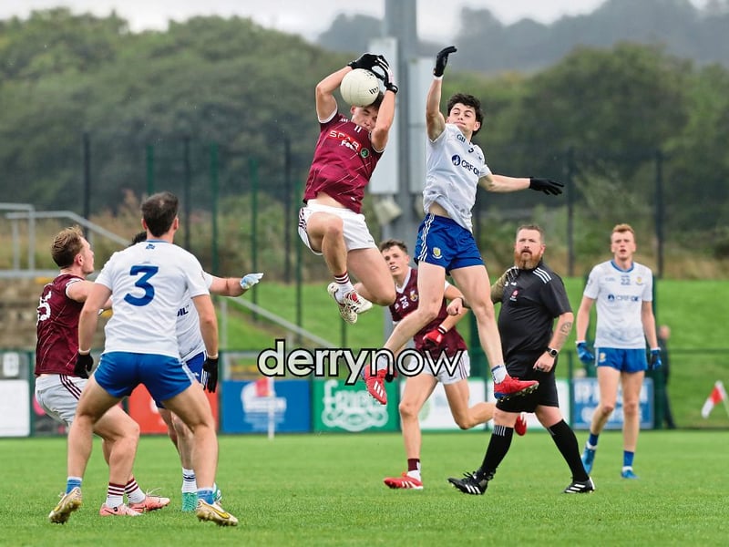 Banagher Eamon Feeney with Shea McCann of Ballinderry during the Derry SFC match at Owenbeg.