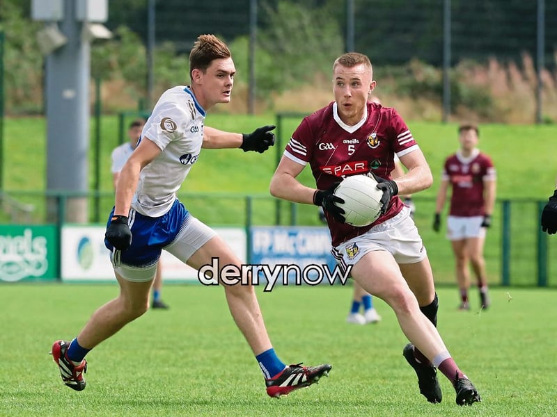 Banagher Keelan O'Kane with Jack Bell of Ballinderry during the Derry SFC match at Owenbeg.