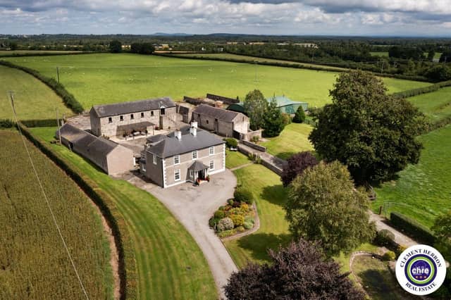 A stunning Georgian property has hit the market in Laois this week. The 19th century Cappakeel House in Emo could be yours, for a cool €1.2 million. Clement Herron Real Estate proudly presents Cappakeel House, a truly exceptional Georgian estate, dating back to circa 1820, situated just moments from the M7 motorway. A striking and private residence positioned on approximately 1.27 hectares (3.14 acres) of lush gardens and pasture, this is a home of rare charm, integrity, and scale. Approached via a tree-lined driveway, the main house immediately commands attention with its perfectly symmetrical Georgian façade, framed by landscaped lawns and mature specimen trees. The property offers the best of both worlds: a timeless period home in pristine condition with carefully preserved original features, and a remarkable opportunity for extensive residential development already granted by planning. The current accommodation spans two floors and includes a charming storm porch leading into an elegant entrance hallway with original Georgian tiled floors, high ceilings, and double doors into the main living spaces. The sitting room and formal dining room sit to either side, both bathed in natural light, feature fireplaces, and ornate coving still in place. To the rear of the house is the kitchen and dining area, a warm and inviting space that leads to a ground floor guest w.c. A standout feature of the home is the broad half-turn staircase which gracefully rises to the first floor. The landing offers a true sense of space and leads to four generously sized bedrooms, each full of character and light, along with the main bathroom, which retains the traditional elegance in keeping with the period style. The home is heated via oil-fired central heating and also benefits from a solid fuel stove for added comfort. The house is in excellent decorative order throughout, with a clear emphasis on preserving the architectural details of the Georgian period while maintaining everyday practicality. The internal spaces feel