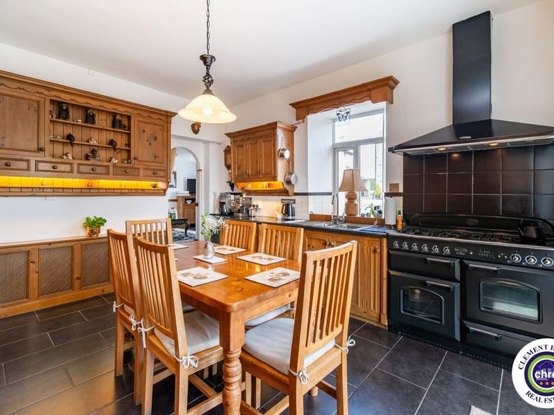 A stunning Georgian property has hit the market in Laois this week. The 19th century Cappakeel House in Emo could be yours, for a cool €1.2 million. Clement Herron Real Estate proudly presents Cappakeel House, a truly exceptional Georgian estate, dating back to circa 1820, situated just moments from the M7 motorway. A striking and private residence positioned on approximately 1.27 hectares (3.14 acres) of lush gardens and pasture, this is a home of rare charm, integrity, and scale. Approached via a tree-lined driveway, the main house immediately commands attention with its perfectly symmetrical Georgian façade, framed by landscaped lawns and mature specimen trees. The property offers the best of both worlds: a timeless period home in pristine condition with carefully preserved original features, and a remarkable opportunity for extensive residential development already granted by planning. The current accommodation spans two floors and includes a charming storm porch leading into an elegant entrance hallway with original Georgian tiled floors, high ceilings, and double doors into the main living spaces. The sitting room and formal dining room sit to either side, both bathed in natural light, feature fireplaces, and ornate coving still in place. To the rear of the house is the kitchen and dining area, a warm and inviting space that leads to a ground floor guest w.c. A standout feature of the home is the broad half-turn staircase which gracefully rises to the first floor. The landing offers a true sense of space and leads to four generously sized bedrooms, each full of character and light, along with the main bathroom, which retains the traditional elegance in keeping with the period style. The home is heated via oil-fired central heating and also benefits from a solid fuel stove for added comfort. The house is in excellent decorative order throughout, with a clear emphasis on preserving the architectural details of the Georgian period while maintaining everyday practicality. The internal spaces feel