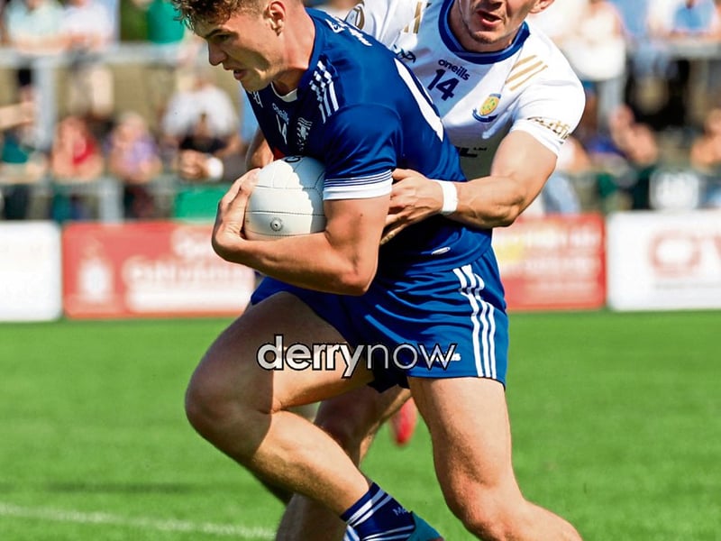 Ballinderry's Shea Colman tries to steal the ball from Ballaghy Charlie Diamond in the Derry SFC Round 1 at Owenbeg on Sunday.