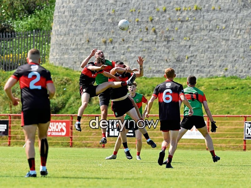 Doire Trasna and Sean Dolans players contest a high ball.