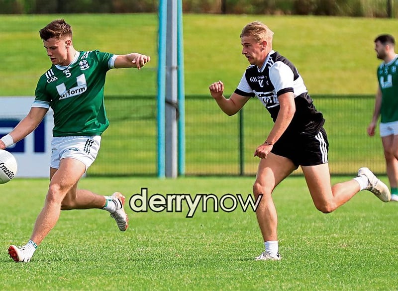 Newbridge's Mark Doherty prepares to send the ball up the field.