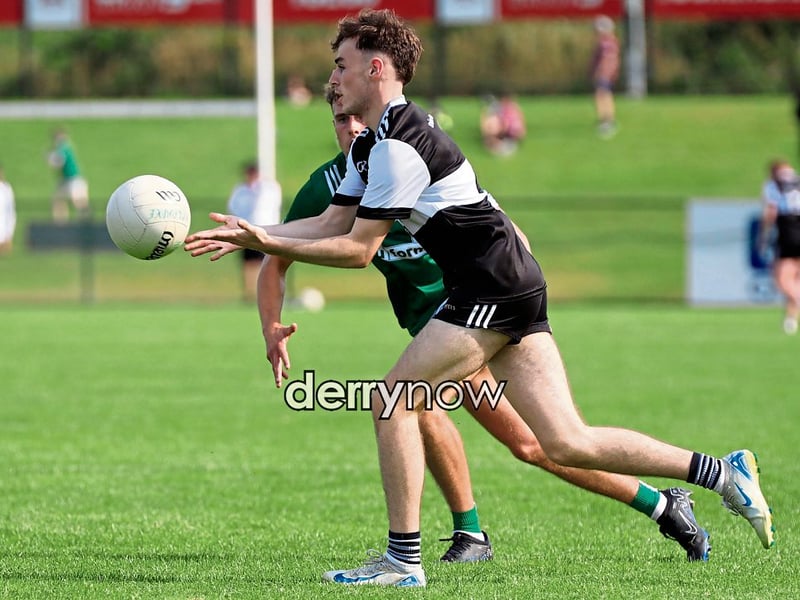 Dungiven's Niall McKeever prepares to grab this ball. 