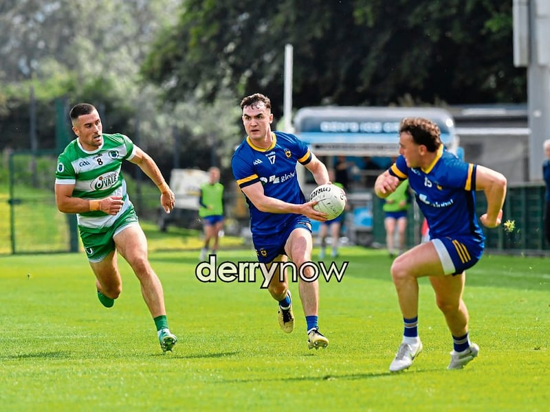 Steelstown’s Diarmuid Baker charges forward against Faughanvale.