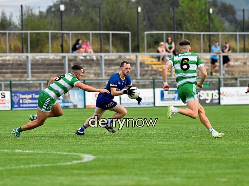 Neil Forester of Steelstown comes under pressure.