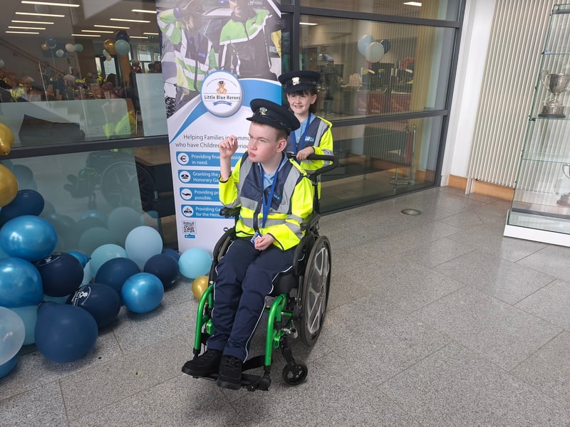 There was smiles and laughter in abundance at Templemore Garda College, as 31 new Gardaí were conferred as part of the Little Blue Heroes foundation, August 19. Families and spectators were treated to a marching performance from the Garda class of 2025, intake 244 - who are set to graduate themselves on Friday, August 22. Children and teenagers with serious illnesses received honorary degrees and badges. Comedian and actor Pat Shortt was in attendance at the event representing the Blue Knights motorcycle club, to the delight of many parents along with the new honorary Gardaí. Paw Patrol and Minnie Mouse also hit the scene and proved to be very popular with the Little Blue Heroes. READ MORE: Ever hear of a split mortgage? Third option for homebuyers in fixed vs variable debate The Gardaí have raised one million Euro for the Little Blue Heroes, according to the charity’s co-founder Alan Roughneen. One parent said that while financial assistance for families with serious illnesses is a part of the Little Blue Heroes, the Gardaí are extremely subtle about fundraising, and never do so in front of the children. The charity also runs a buddy program, where an assigned volunteer Garda will regularly visit a family they are paired with. After a parade which featured motorcycles, Garda escorts and of course the new honorary recruits, Alan Roughneen gave a speech thanking the Little Blue Heroes for their “ongoing engagement and friendship with our Garda Buddies” saying that their effort is “what makes our honorary Garda program work”. The Little Blue Heroes Foundation was established in 2017, and is a charity led by Garda members, retired Garda members and people from local communities on a voluntary basis.