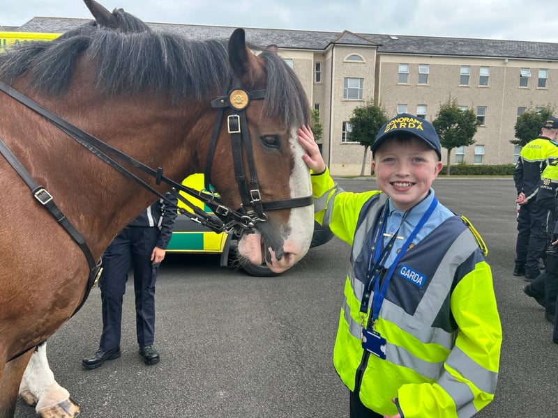 There was smiles and laughter in abundance at Templemore Garda College, as 31 new Gardaí were conferred as part of the Little Blue Heroes foundation, August 19. Families and spectators were treated to a marching performance from the Garda class of 2025, intake 244 - who are set to graduate themselves on Friday, August 22. Children and teenagers with serious illnesses received honorary degrees and badges. Comedian and actor Pat Shortt was in attendance at the event representing the Blue Knights motorcycle club, to the delight of many parents along with the new honorary Gardaí. Paw Patrol and Minnie Mouse also hit the scene and proved to be very popular with the Little Blue Heroes. READ MORE: Ever hear of a split mortgage? Third option for homebuyers in fixed vs variable debate The Gardaí have raised one million Euro for the Little Blue Heroes, according to the charity’s co-founder Alan Roughneen. One parent said that while financial assistance for families with serious illnesses is a part of the Little Blue Heroes, the Gardaí are extremely subtle about fundraising, and never do so in front of the children. The charity also runs a buddy program, where an assigned volunteer Garda will regularly visit a family they are paired with. After a parade which featured motorcycles, Garda escorts and of course the new honorary recruits, Alan Roughneen gave a speech thanking the Little Blue Heroes for their “ongoing engagement and friendship with our Garda Buddies” saying that their effort is “what makes our honorary Garda program work”. The Little Blue Heroes Foundation was established in 2017, and is a charity led by Garda members, retired Garda members and people from local communities on a voluntary basis.