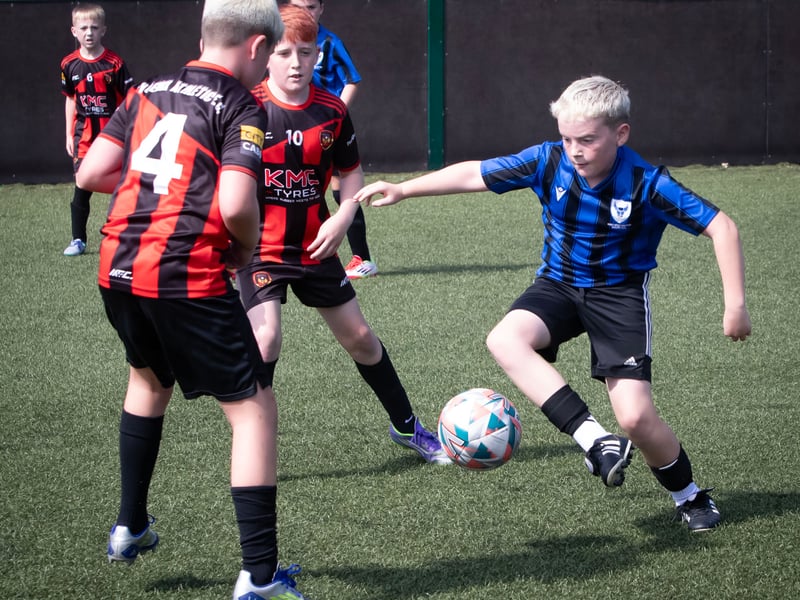 Action from the semi-final clash between Phoenix Athletic and Oxford United.