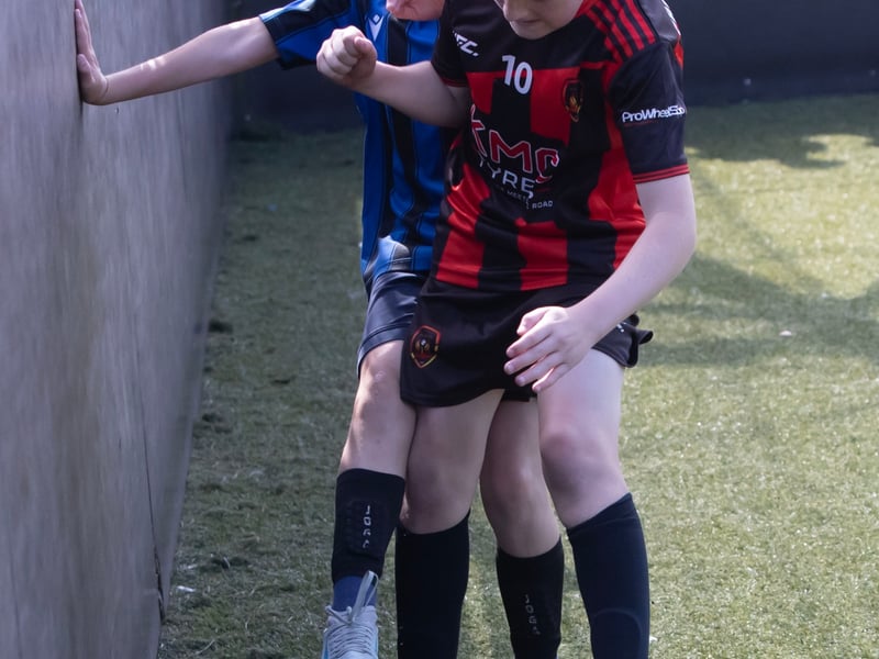 Action from the semi-final clash between Phoenix Athletic and Oxford United at Bay Road.