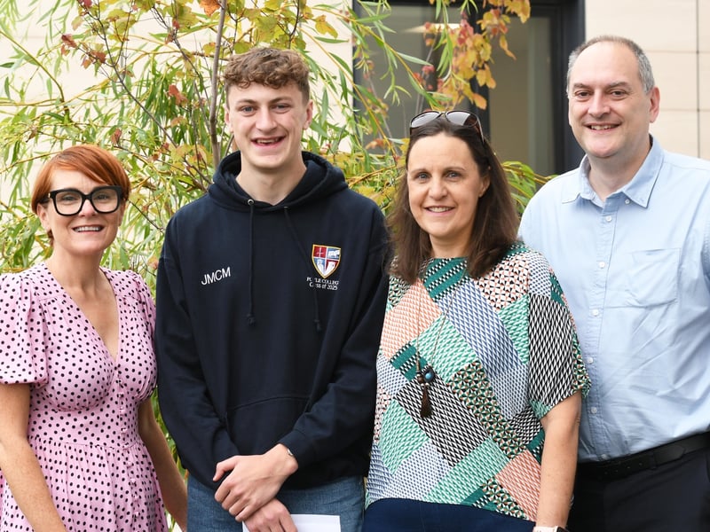 Deirdre McLaughlin, Principal, with James McMorris and his proud parents Lorraine and Douglas.