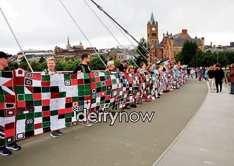 Derry's newly formed RISE for Palestine organisation, with those who created the Granny Squares for Gaza quilt on the Peace Bridge on Tuesday. (Photos - Tom Heaney, nwpresspics)