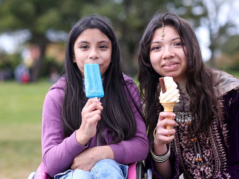 Sisters Amira, 10, and Alisha, 16. Vaisakhi Mela, Castle Field, Southsea
Picture: Chris Moorhouse (180426-34)