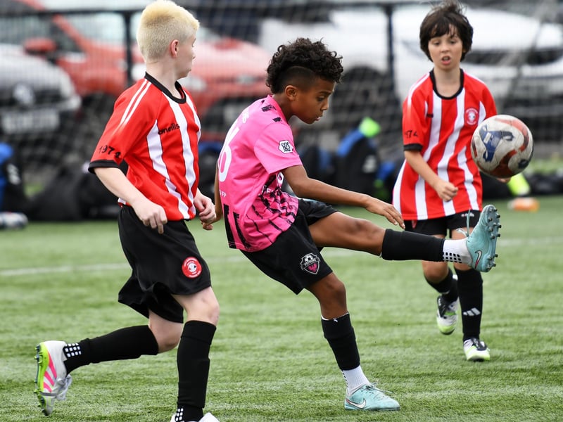 Patruno FB (USA) under-11's player Austin Torres in action during their match against Tristar Colts at the Vale Centre.