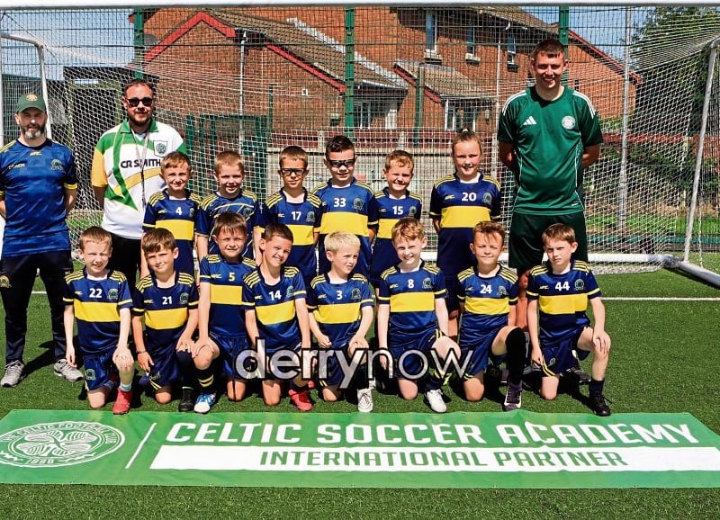 Young players who took part in the Don Boscos Celtic Camp held at Leafair. Included on left, are Marty Crumley and Matt Rafferty, Don Boscos FC, with on right Thomas Kelly, Celtic Youth coach.