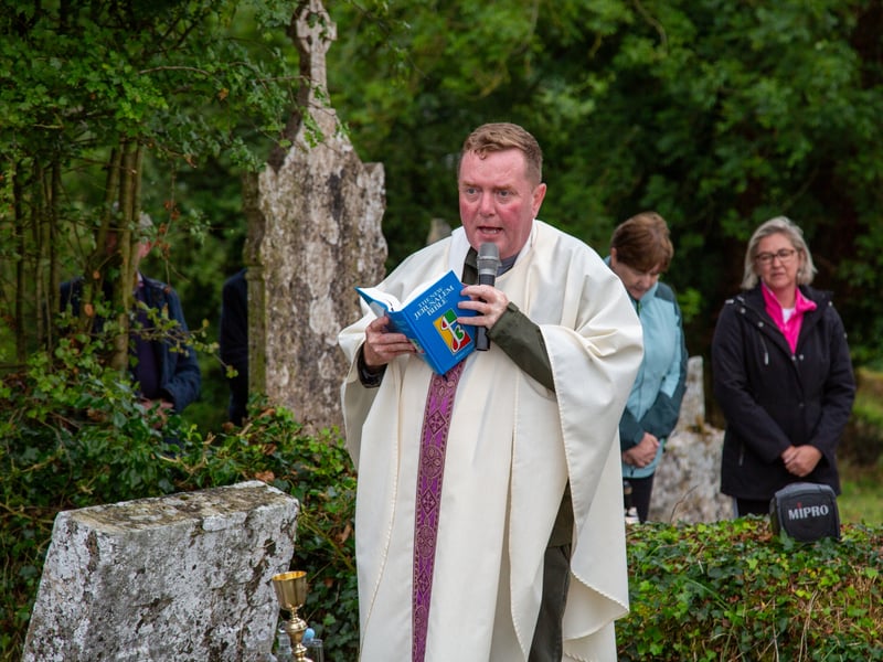 A cemetery mass has been held in a Laois graveyard for the first time in over 100 years. Photos by Stephen Murphy. It is not known exactly how old Kilcronan cemetery in Ballinakill is, with the oldest headstone in the graveyard dated 1758. It has been over 100 years since a cemetery mass was held in the graveyard, and over ten years since the graveyard was cleaned up. The parish council recently organised the clean up of the graveyard, with help from local man Patrick O'Meara. Fr Paddy Byrne blessed the graves and the graveyard, with over 74 locals in attendance. "The cemetery mass went very well, there was a huge crowd," Chair of Ballinakill's Parish Council, Mr Patrick McDonnell told the Leinster Express / Laois Live. "It had been ten years since the last time the graveyard was cleaned up, and it was over thirty years the time before that. This was also the first graveyard mass to be held in over 100 years," Mr McDonnell explained. "There are a couple of hundred people buried in the graveyard. Years and years ago, there were bodies washed away in a flood, with coffins seen floating down the river," he said. "The last person to be buried here was in 1993." The parish council have said that they intend to hold a graveyard mass in Kilcronan every year, from now on. Located on the west bank of the Owenbeg river, the graveyard contains ruins of a medieval church and monastery associated with St Cronan. The graveyard contains ruins of medieval church marked on an 1841 Ordinance Survey map as 'Kilcronan Church (in ruins)'. The ruins of this monastery are fragmented, consisting simply of parts of the west gable and south wall. Read Next: Curtain call: Portlaoise arts centre announces change in leadership