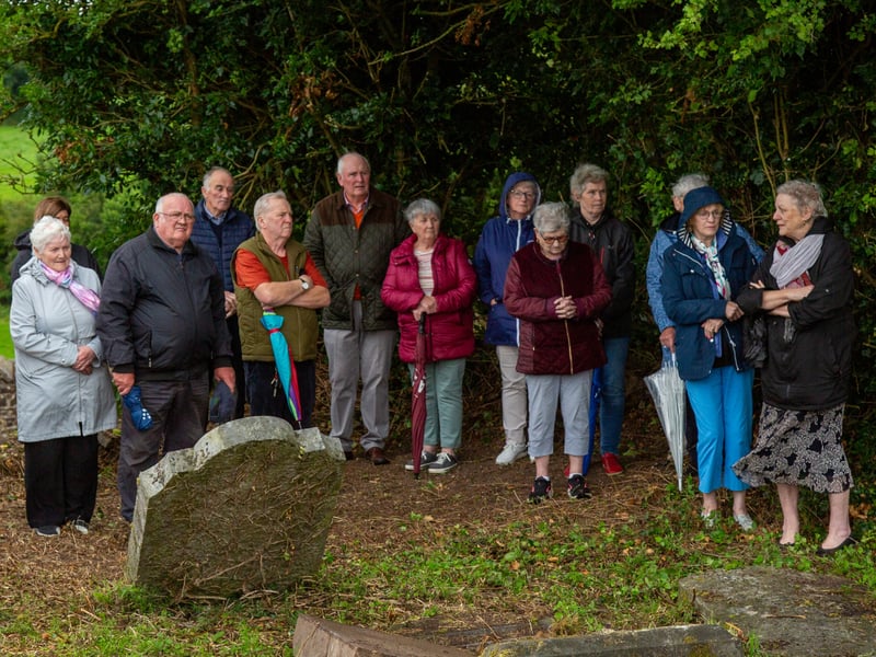 A cemetery mass has been held in a Laois graveyard for the first time in over 100 years. Photos by Stephen Murphy. It is not known exactly how old Kilcronan cemetery in Ballinakill is, with the oldest headstone in the graveyard dated 1758. It has been over 100 years since a cemetery mass was held in the graveyard, and over ten years since the graveyard was cleaned up. The parish council recently organised the clean up of the graveyard, with help from local man Patrick O'Meara. Fr Paddy Byrne blessed the graves and the graveyard, with over 74 locals in attendance. "The cemetery mass went very well, there was a huge crowd," Chair of Ballinakill's Parish Council, Mr Patrick McDonnell told the Leinster Express / Laois Live. "It had been ten years since the last time the graveyard was cleaned up, and it was over thirty years the time before that. This was also the first graveyard mass to be held in over 100 years," Mr McDonnell explained. "There are a couple of hundred people buried in the graveyard. Years and years ago, there were bodies washed away in a flood, with coffins seen floating down the river," he said. "The last person to be buried here was in 1993." The parish council have said that they intend to hold a graveyard mass in Kilcronan every year, from now on. Located on the west bank of the Owenbeg river, the graveyard contains ruins of a medieval church and monastery associated with St Cronan. The graveyard contains ruins of medieval church marked on an 1841 Ordinance Survey map as 'Kilcronan Church (in ruins)'. The ruins of this monastery are fragmented, consisting simply of parts of the west gable and south wall. Read Next: Curtain call: Portlaoise arts centre announces change in leadership