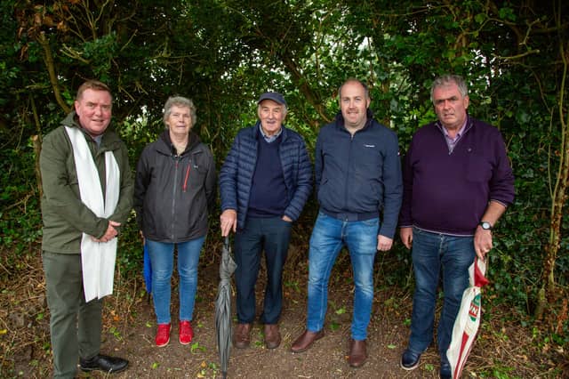 A cemetery mass has been held in a Laois graveyard for the first time in over 100 years. Photos by Stephen Murphy. It is not known exactly how old Kilcronan cemetery in Ballinakill is, with the oldest headstone in the graveyard dated 1758. It has been over 100 years since a cemetery mass was held in the graveyard, and over ten years since the graveyard was cleaned up. The parish council recently organised the clean up of the graveyard, with help from local man Patrick O'Meara. Fr Paddy Byrne blessed the graves and the graveyard, with over 74 locals in attendance. "The cemetery mass went very well, there was a huge crowd," Chair of Ballinakill's Parish Council, Mr Patrick McDonnell told the Leinster Express / Laois Live. "It had been ten years since the last time the graveyard was cleaned up, and it was over thirty years the time before that. This was also the first graveyard mass to be held in over 100 years," Mr McDonnell explained. "There are a couple of hundred people buried in the graveyard. Years and years ago, there were bodies washed away in a flood, with coffins seen floating down the river," he said. "The last person to be buried here was in 1993." The parish council have said that they intend to hold a graveyard mass in Kilcronan every year, from now on. Located on the west bank of the Owenbeg river, the graveyard contains ruins of a medieval church and monastery associated with St Cronan. The graveyard contains ruins of medieval church marked on an 1841 Ordinance Survey map as 'Kilcronan Church (in ruins)'. The ruins of this monastery are fragmented, consisting simply of parts of the west gable and south wall. Read Next: Curtain call: Portlaoise arts centre announces change in leadership