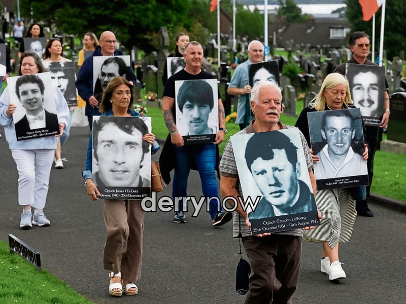 The portraits of fallen volunteers carried at the annual Volunteers Commemoration.