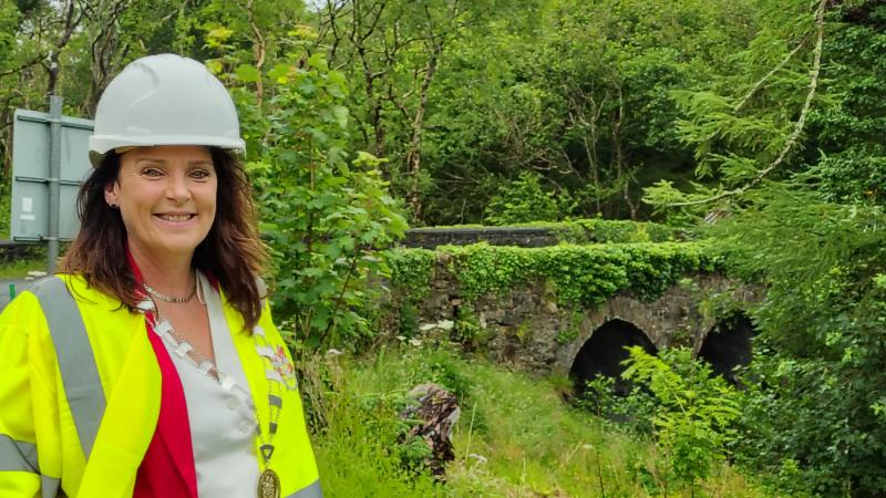 The sod has been turned at Fintra Bridge, marking the start of a major road upgrade for the area. Click on the arrows to see Siobhan McNamara's photographs from the event: This ceremonial commencement of the project was carried out by Cathaoirleach of Donegal County Council, Cllr Niamh Kennedy (Ind). She was joined by Charlie McConalogue (FF), Minister of State at the Department of Tourism, Culture, Arts, Gaeltacht, Sport and Media. The minister of state told Donegal Live: “It is wonderful to see Fintra get to this point. Public representatives and the people in the council worked really hard over the years to get to the stage where it was funded and the work was sanctioned.  “It is a great honour to be here on behalf of the Minister For Transport Darragh O’Brien, along with Cllr Kennedy, in marking the start of that work. READ NEXT: Winner announced for Donegal’s hottest tickets - Concert With The Greats “The project represents a €12m investment. Fintra Bridge is an important structure on this river and has stood the test of time really well but we can’t expect it to take much more. “This will be a significant piece of work, redefining the access roads and the bridge. “I look forward to seeing the job done.” Also present were Senator Manus Boyle (FG), councillors from Donegal MD, Cllrs Noel Jordan (SF), Michael McMahon (SF), Jimmy Brogan (Ind) and Michael Boyle (FG). Cathaoirleach of Donegal MD, Cllr Micheál Naughton (FF) sent his apologies. Senior Staff from Donegal County Council were in attendance, including Chief Executive John McLaughlin who was involved in the project at an early stage in his former role as Roads Officer. They were joined by representatives from the Department of Transport and from the engineering firm BAM who will be carrying out the work. It is fitting that this was one of the last engagements of Cllr Kennedy in her capacity as Cathaoirleach of Donegal County Council, with her term ending on Monday, June 30. Since being elected to the Municipal District of